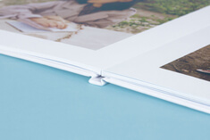 High-quality photo book, lay-flat hardcover, square format, straight open without a binding fold